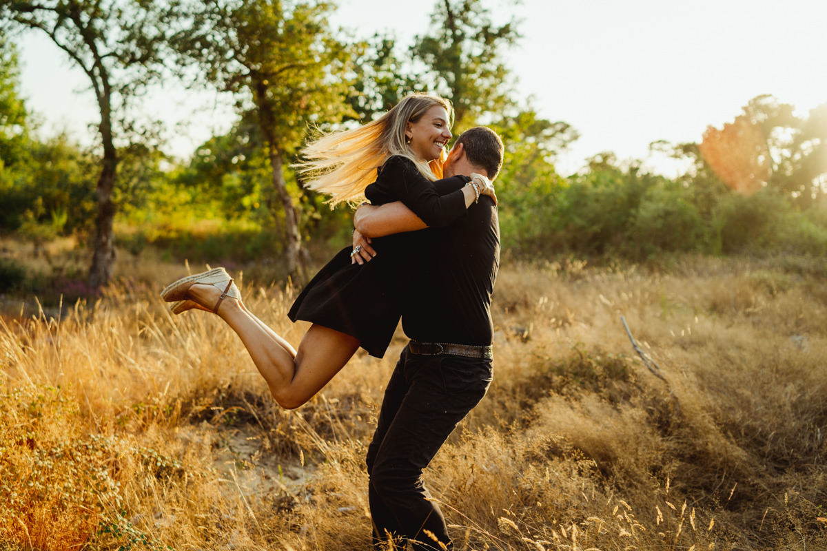 Couple dancing in nature during a photo session